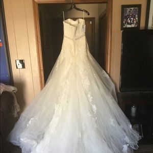 Strapless wedding dress with veil